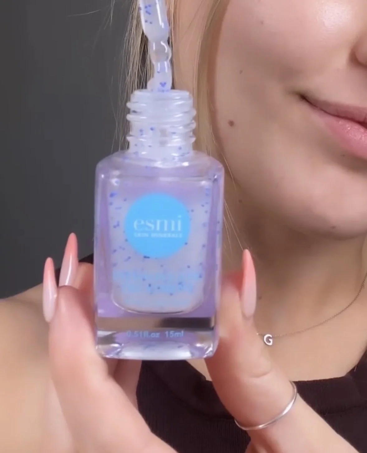 Skincare serum application featured in beauty content creation