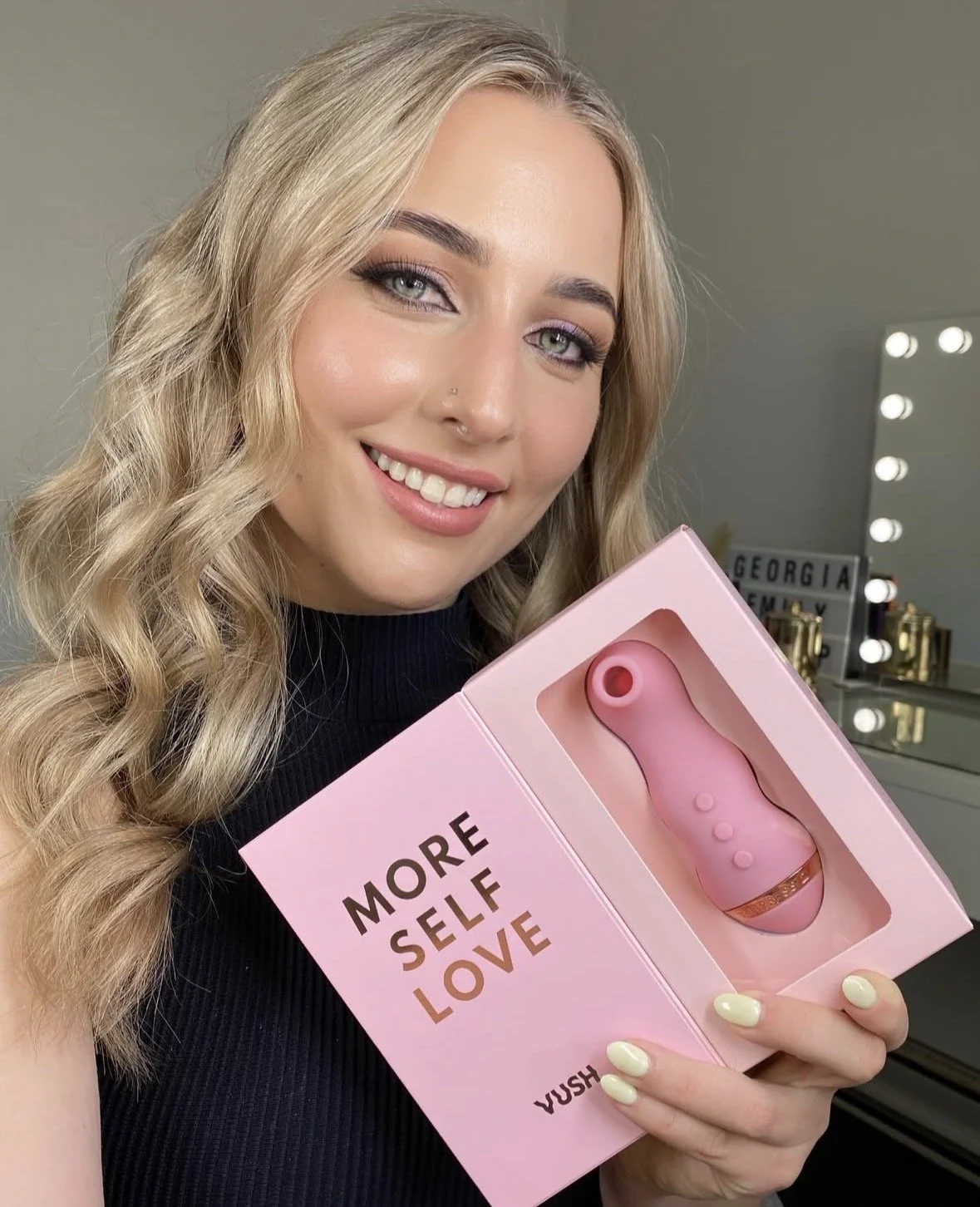 Beauty creator holding self care product during brand collaboration shoot