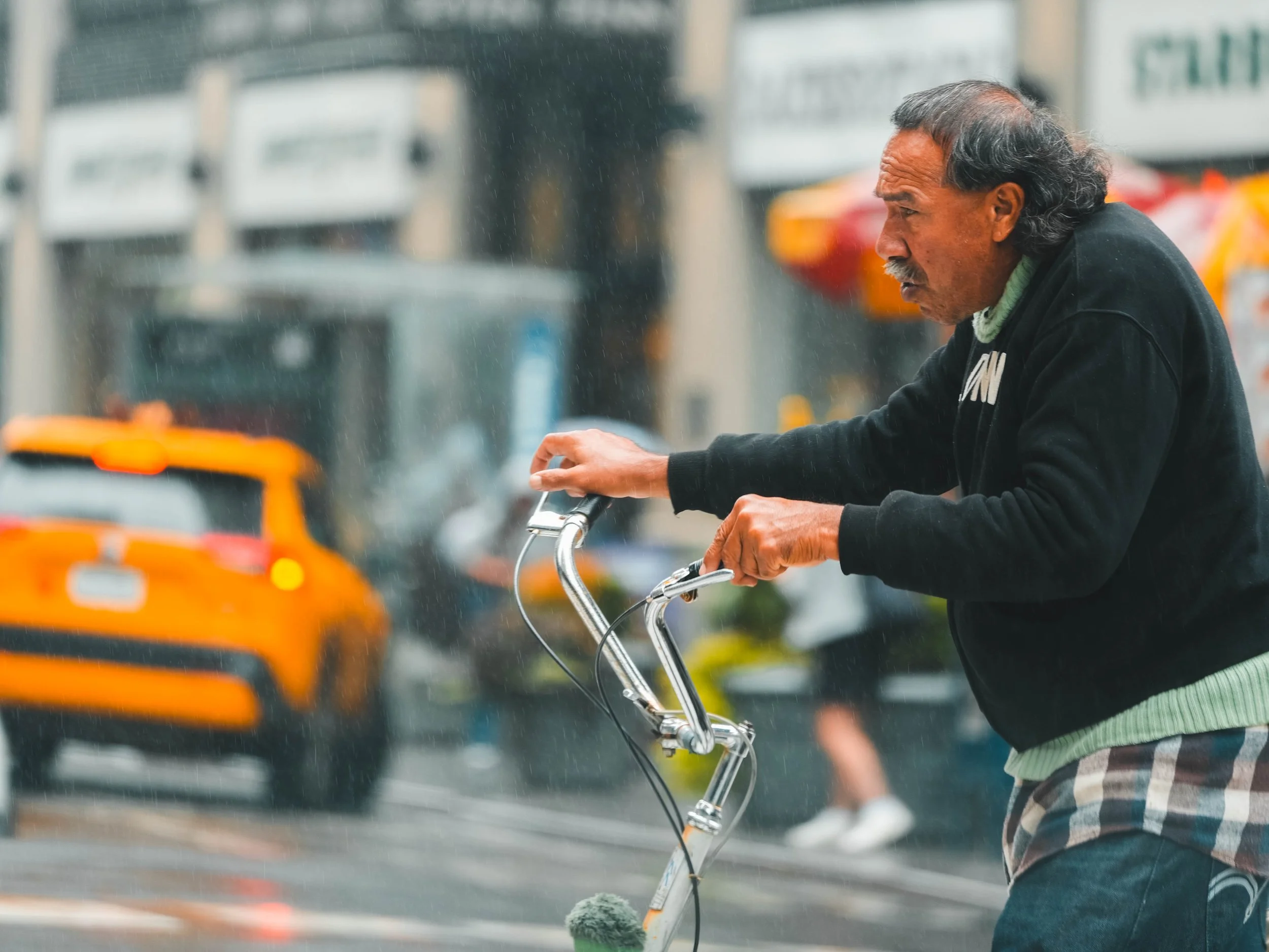 240928_Canal St_guy with bike.jpg