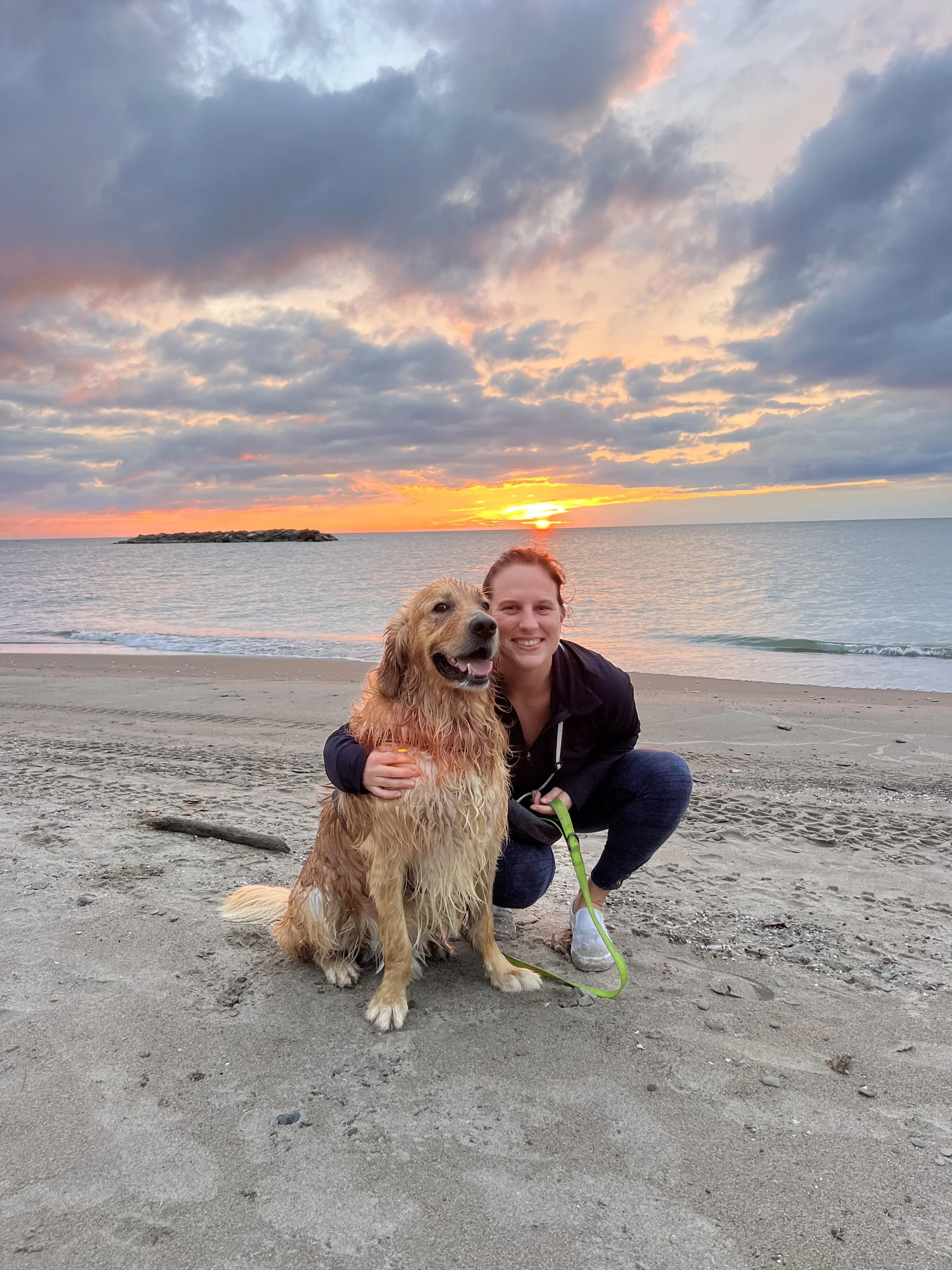 Stephanie Bennett, Licensed Professional Counselor (LPC) based in Erie, Pennsylvania, pictured outdoors with her dog