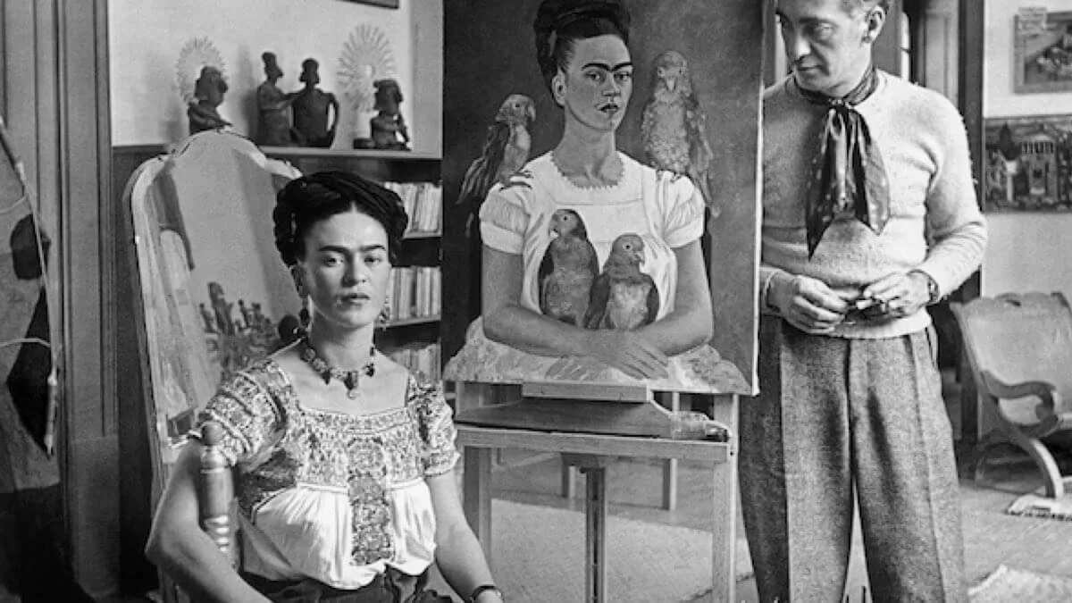 Nickolas-Muray-Frida-Painting-Me-and-My-Parrots-with-Muray-1939-©-The-estate-of-the-artist-and-PDNB-Gallery.jpg