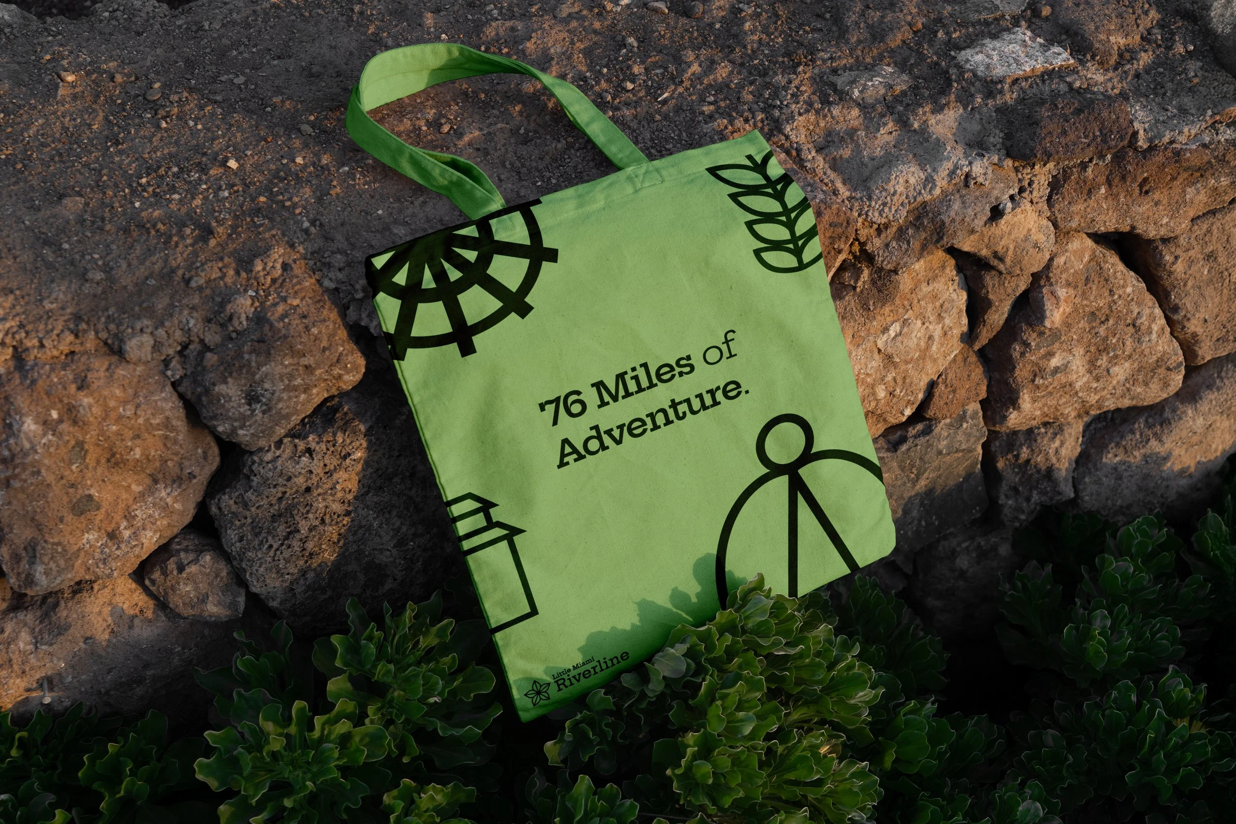 Free Canvas Bag Laying on Stones Mockup.jpg