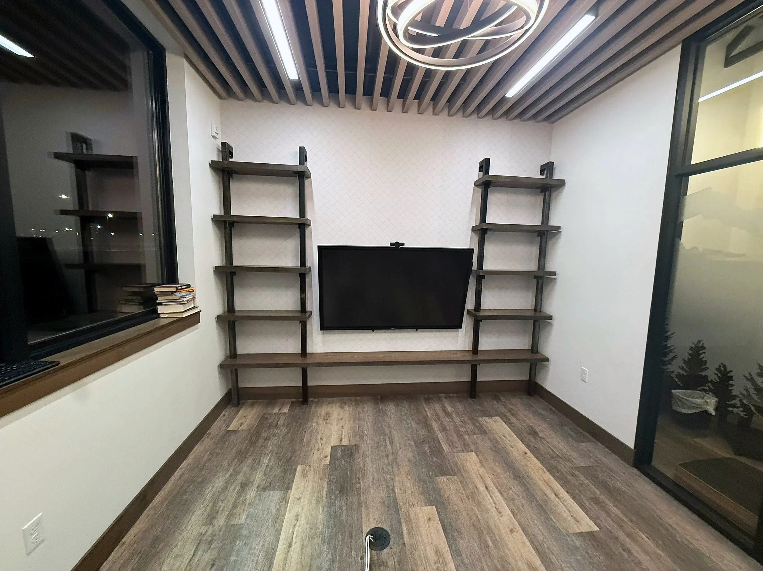 Industrial stained wood and black steel shelving by MV Works, Kalispell, MT