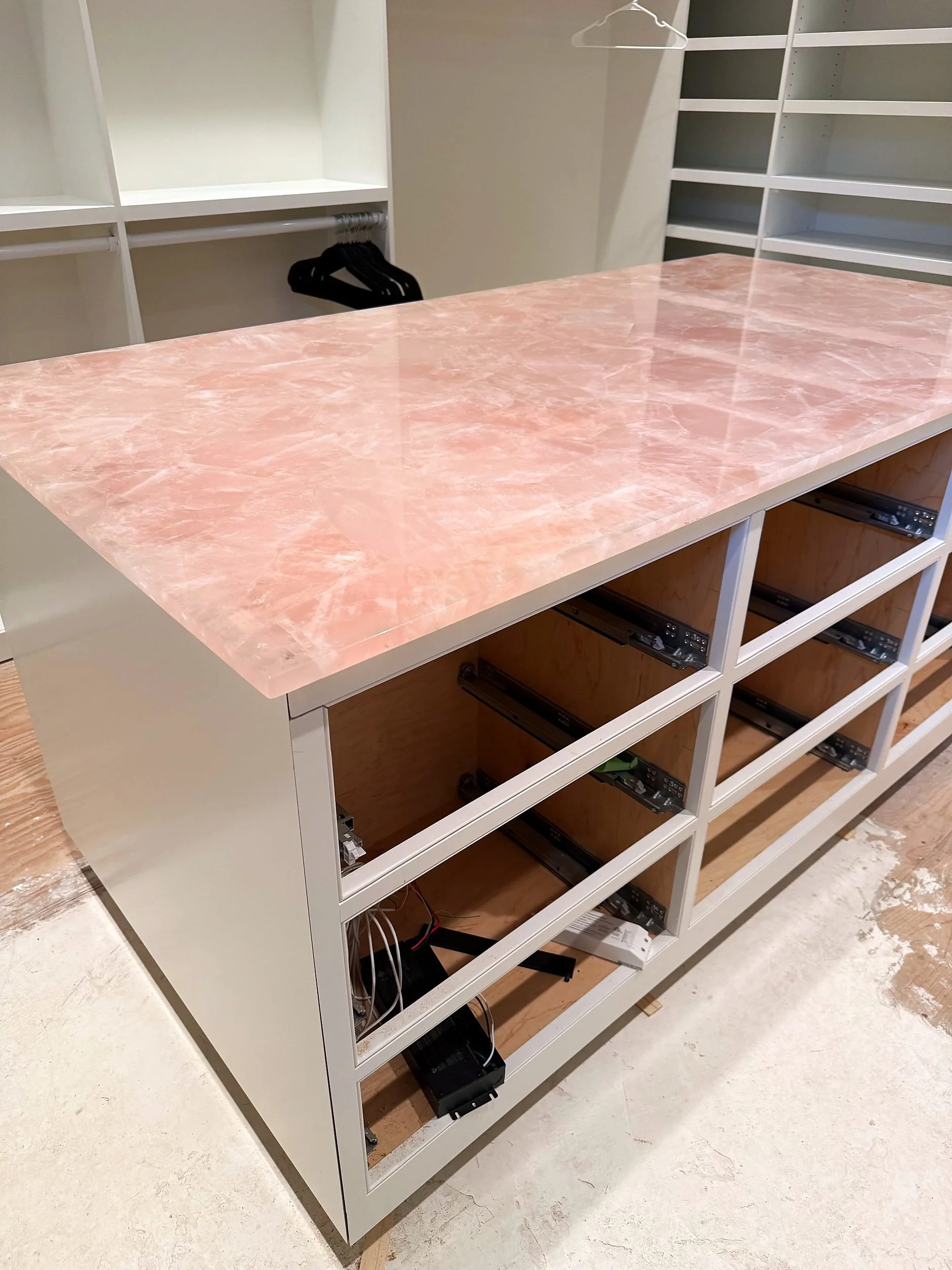 pink-quartz-island-top-walk-in-closet-whitefish-mt-02.jpg