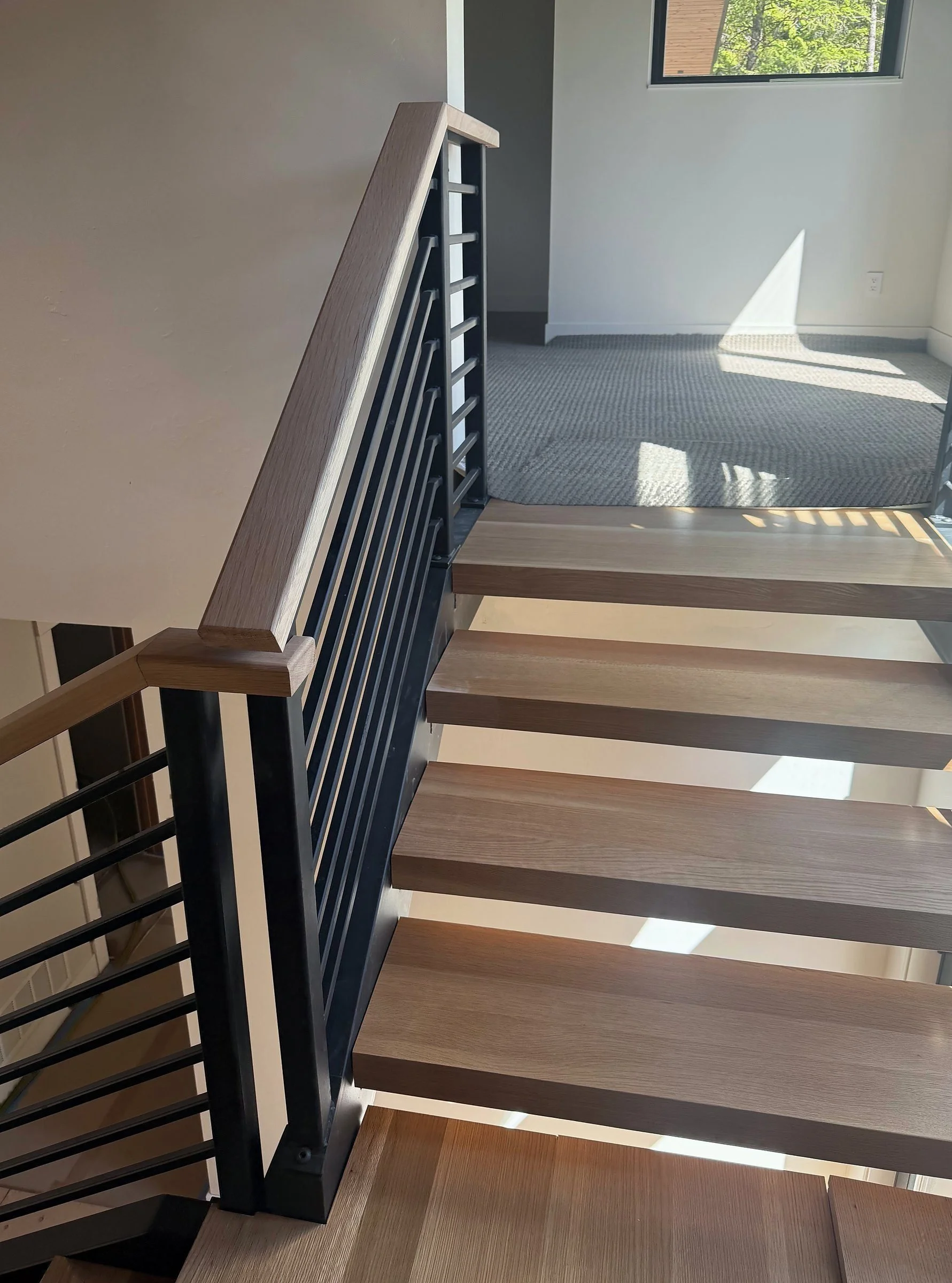 rift-sawn-white-oak-steel-stair-swan-lake-mt-04.jpg
