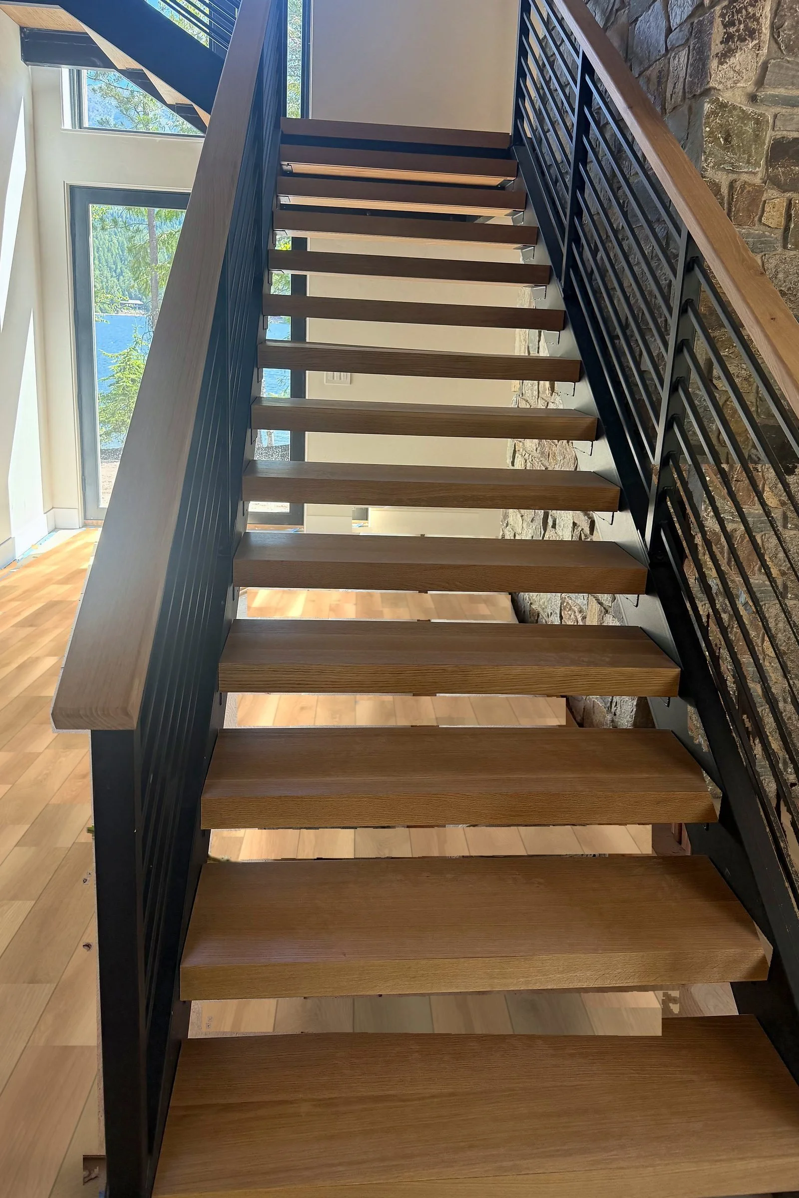 rift-sawn-white-oak-steel-stair-swan-lake-mt-03.jpg