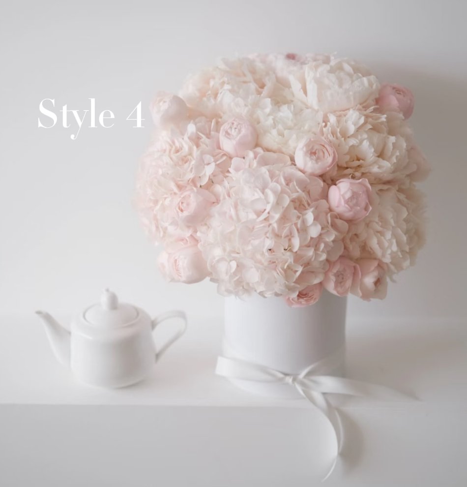 A white vase filled with pink and white hydrangeas and roses, placed on a white surface with a white teapot next to it. Text reads 'Style 4'.