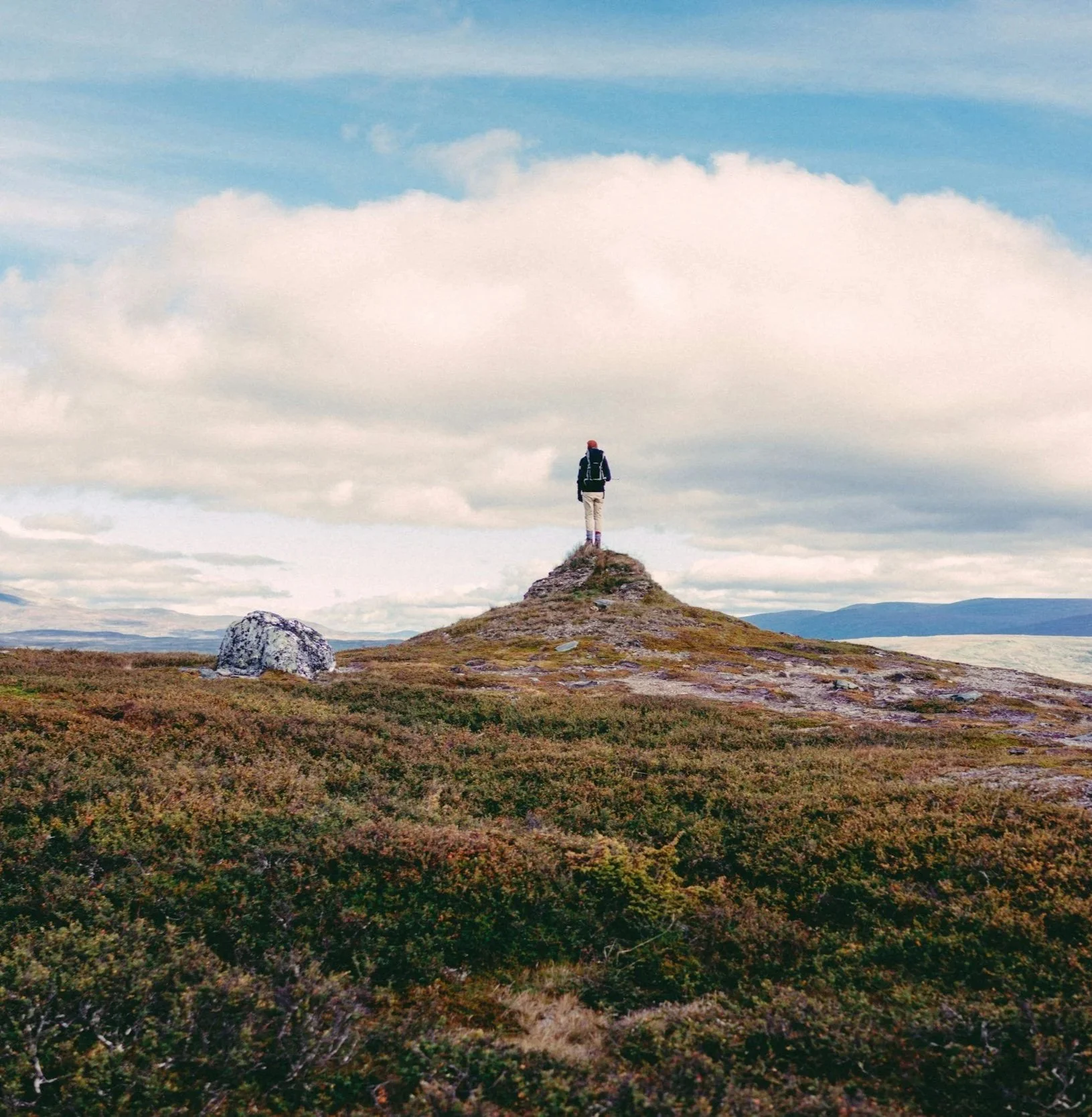 Solo Small Business Owner on top of a mountain