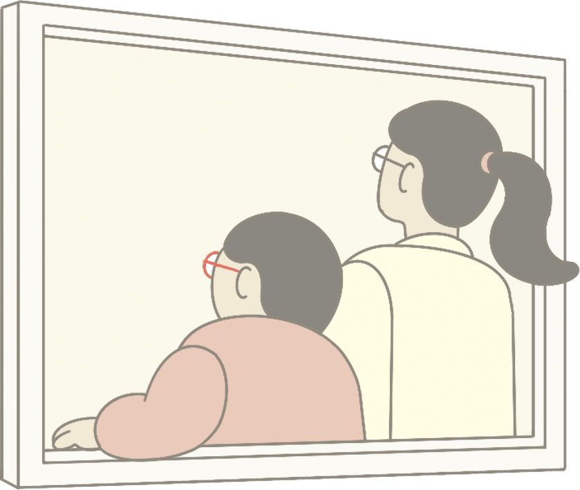 二人の女性が窓越しに見ている様子。