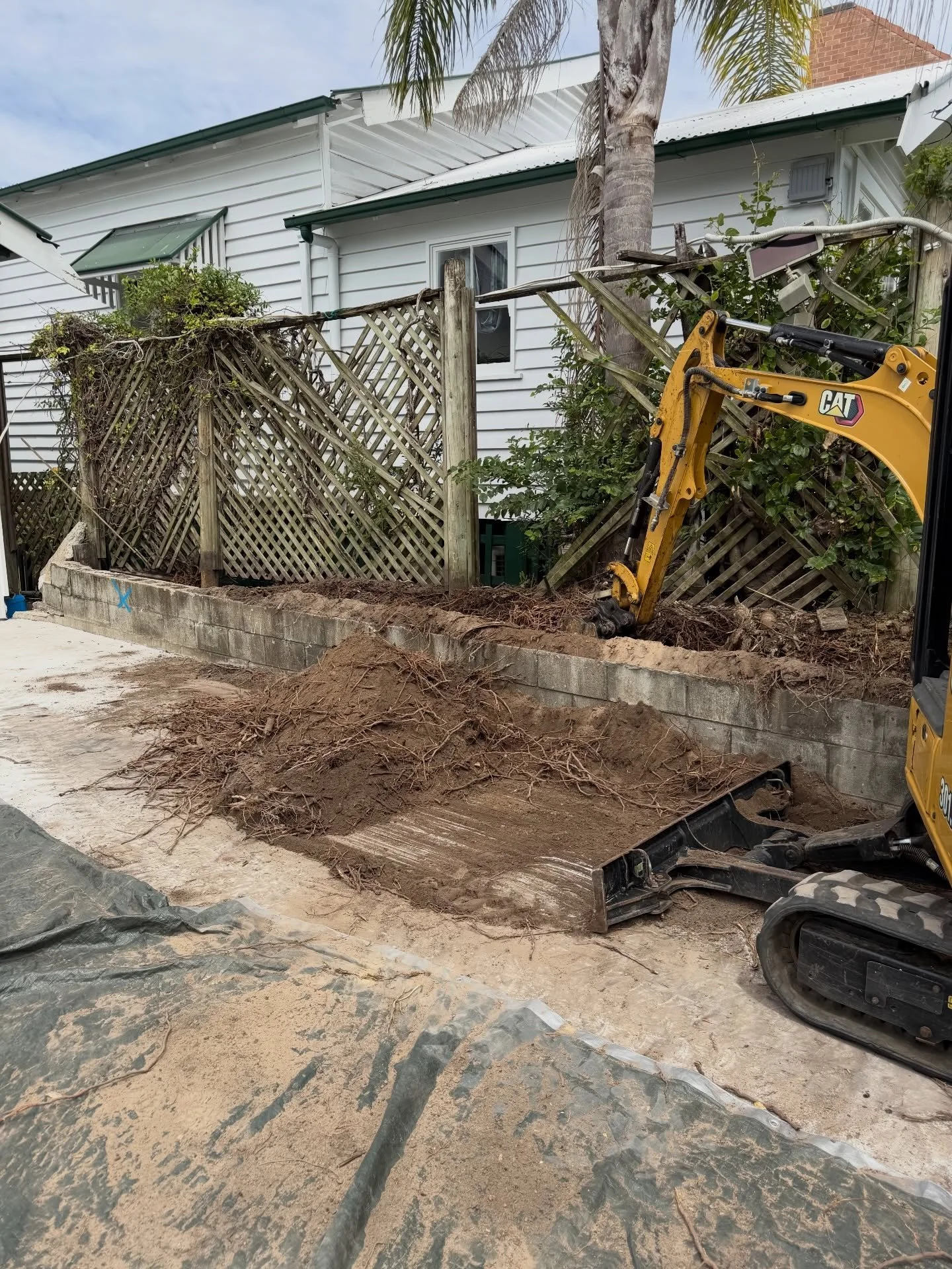 After numerous calls with Energex we were able to help this client remove their retaining wall in preparation for a new garage install.