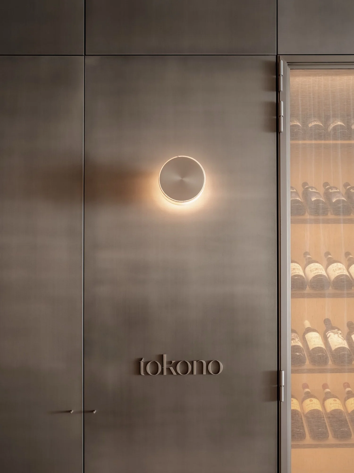Elvina Wines wall of wine bottles at U Collectiv in Knokke