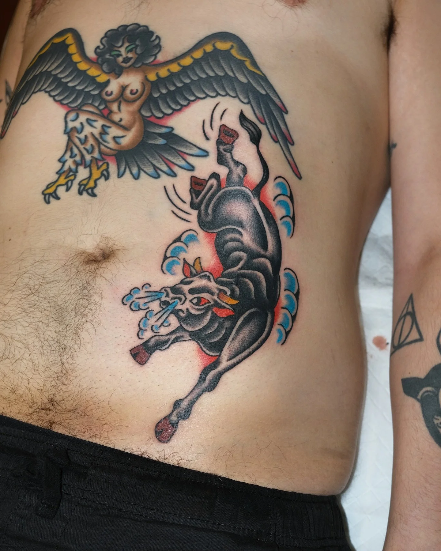 Traditional colour bull and eagle tattoos made by Benjamin Hastings at Tattoo Rosies, Surry Hills, Sydney 