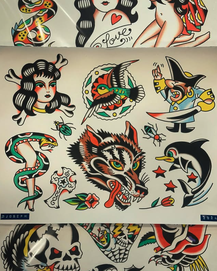 A collection of traditional tattoo flash designs featuring various imagery such as a snake, woman, heart, fish, pirate, wolf, dolphin, skull, and other decorative elements in bold colors and black outlines.