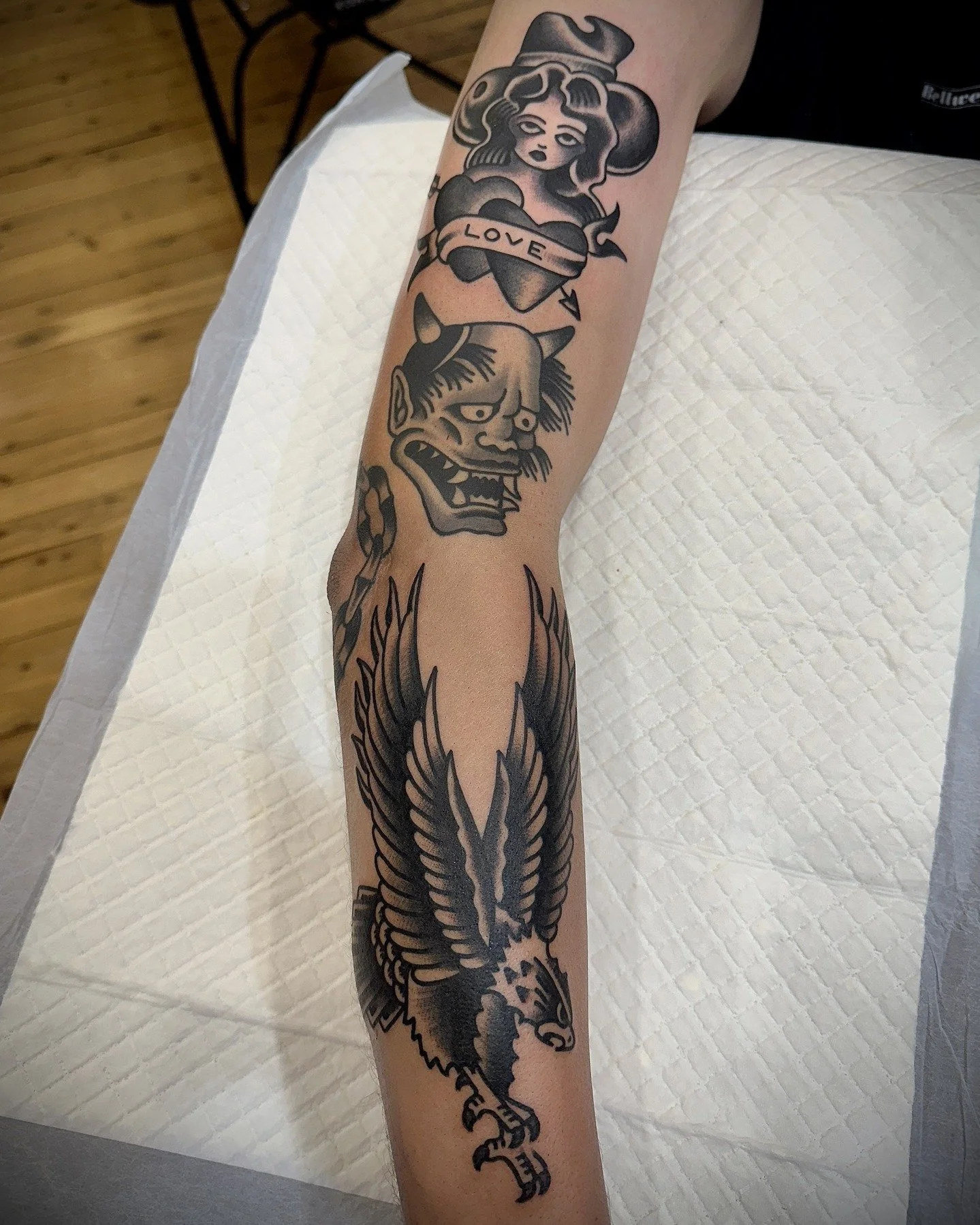Traditional black and grey eagle, hannya mask and girl tattoo made at Tattoo Rosie's Surry Hills, Sydney