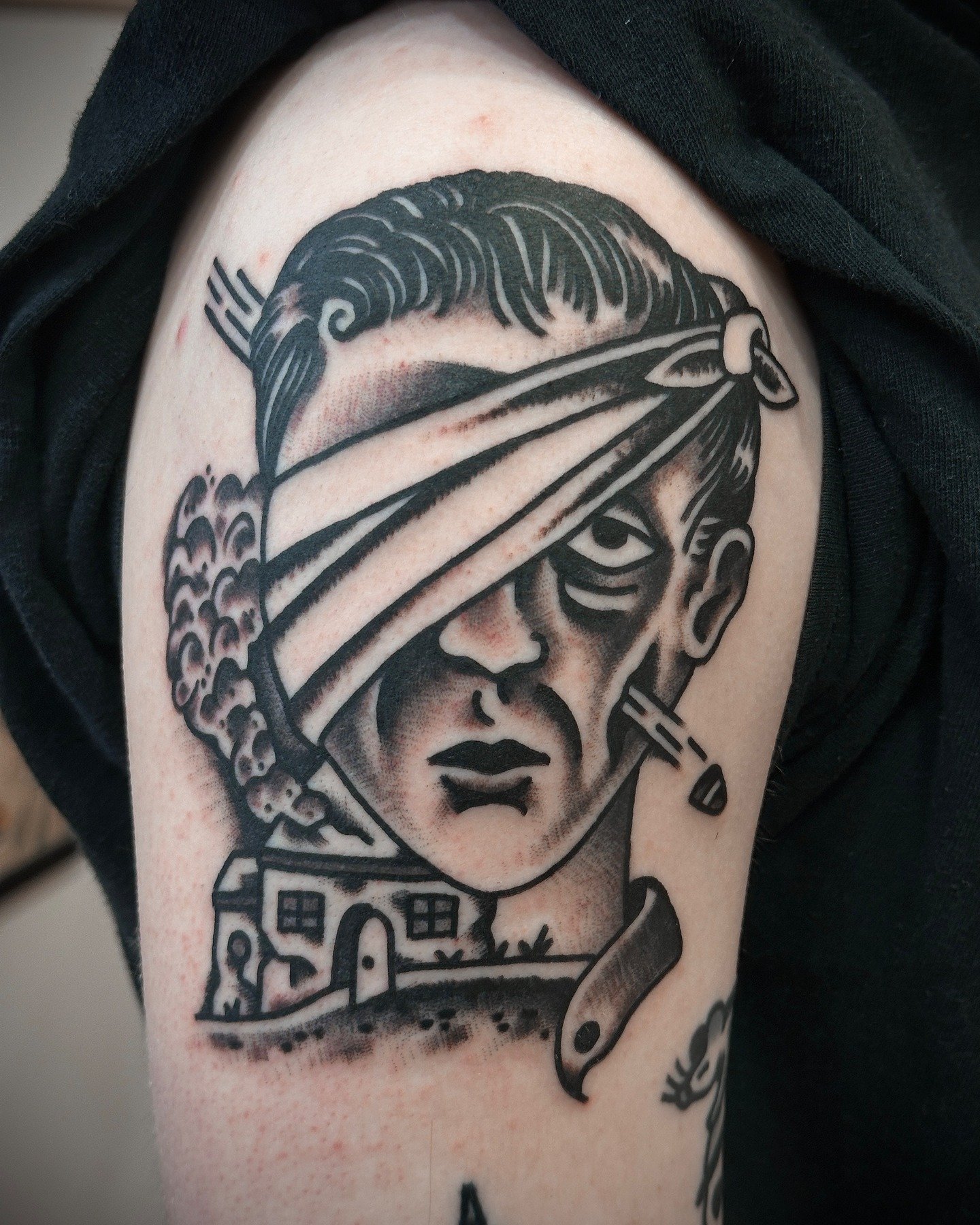 Traditional black and grey face tattoo made at Tattoo Rosie's Surry Hills, Sydney