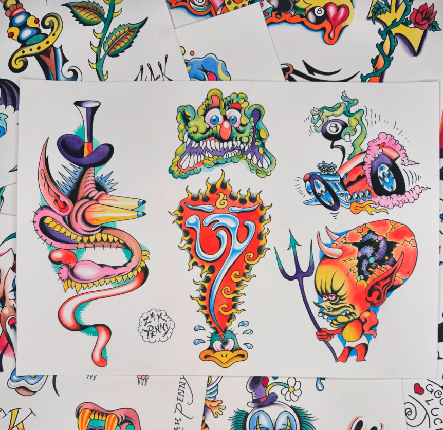 Collection of colorful tattoo flash designs featuring a dragon, a fierce cartoonish face, a flaming number 7, and a horned demon with a trident.