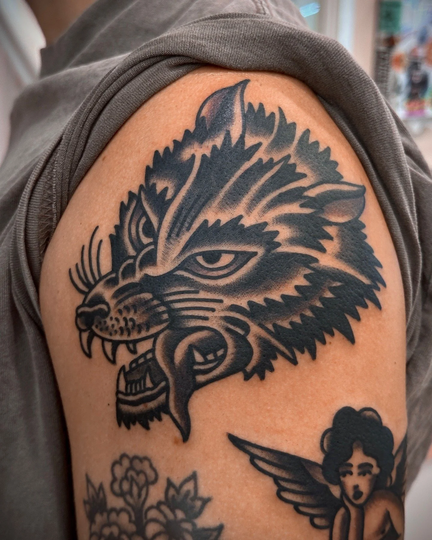 Traditional black and grey wolf tattoo made at Tattoo Rosie's Surry Hills, Sydney