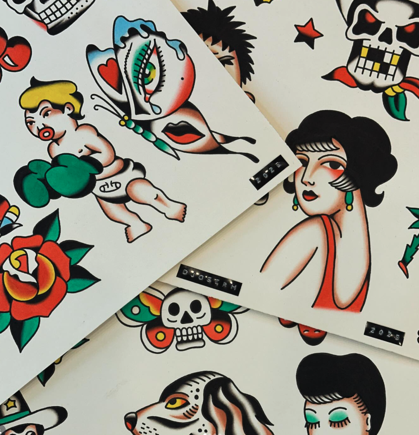 Collection of colorful tattoo flash designs including a woman with short dark hair wearing earrings, a tattooed woman with a tear tattoo, a skull with a snake, a young boy with boxing gloves, a skull with a rainbow tongue, a butterfly with a skull fa
