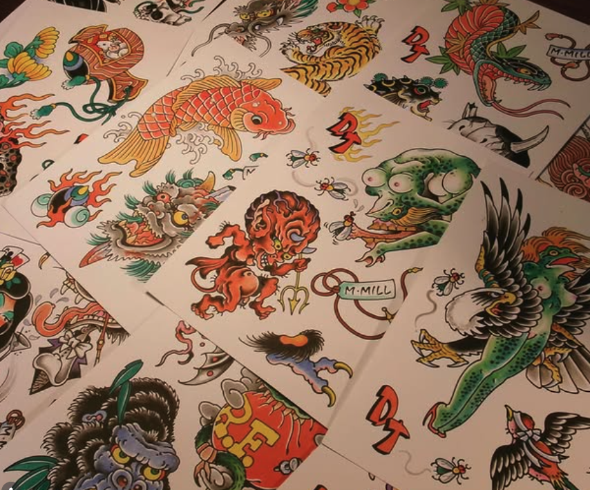 Collection of traditional Japanese tattoo flash designs featuring colorful dragons, lions, serpents, and mythical creatures in various poses.