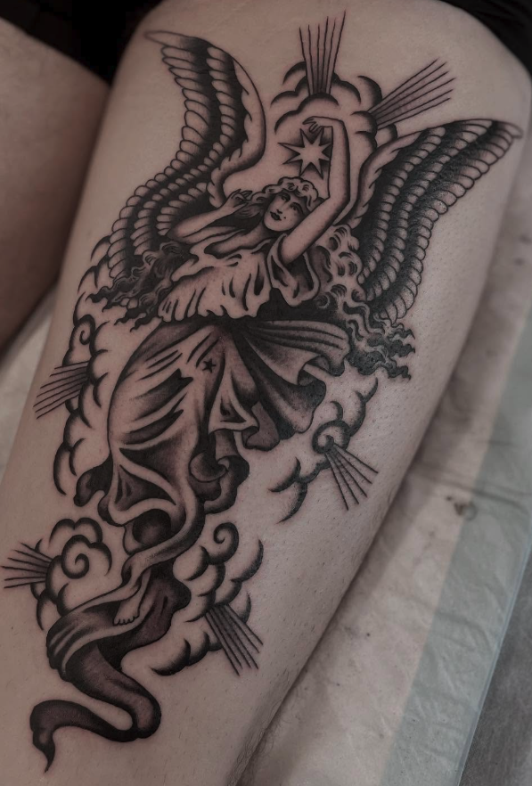 Tattoo of a woman with wings, standing on clouds, holding a star with rays emanating from it.