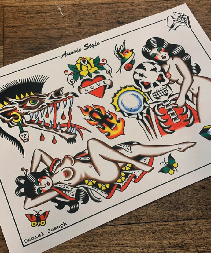 Traditional tattoo flash sheet with various designs including a dragon, pin-up girl, skull, flowers, and animals.