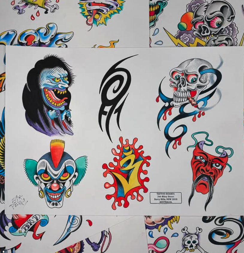 Collection of traditional-style tattoo flash art featuring colorful designs of a gorilla face, a skull with smoke, a clown face, a stylized flame, a red demon, and a red face with a long tongue.