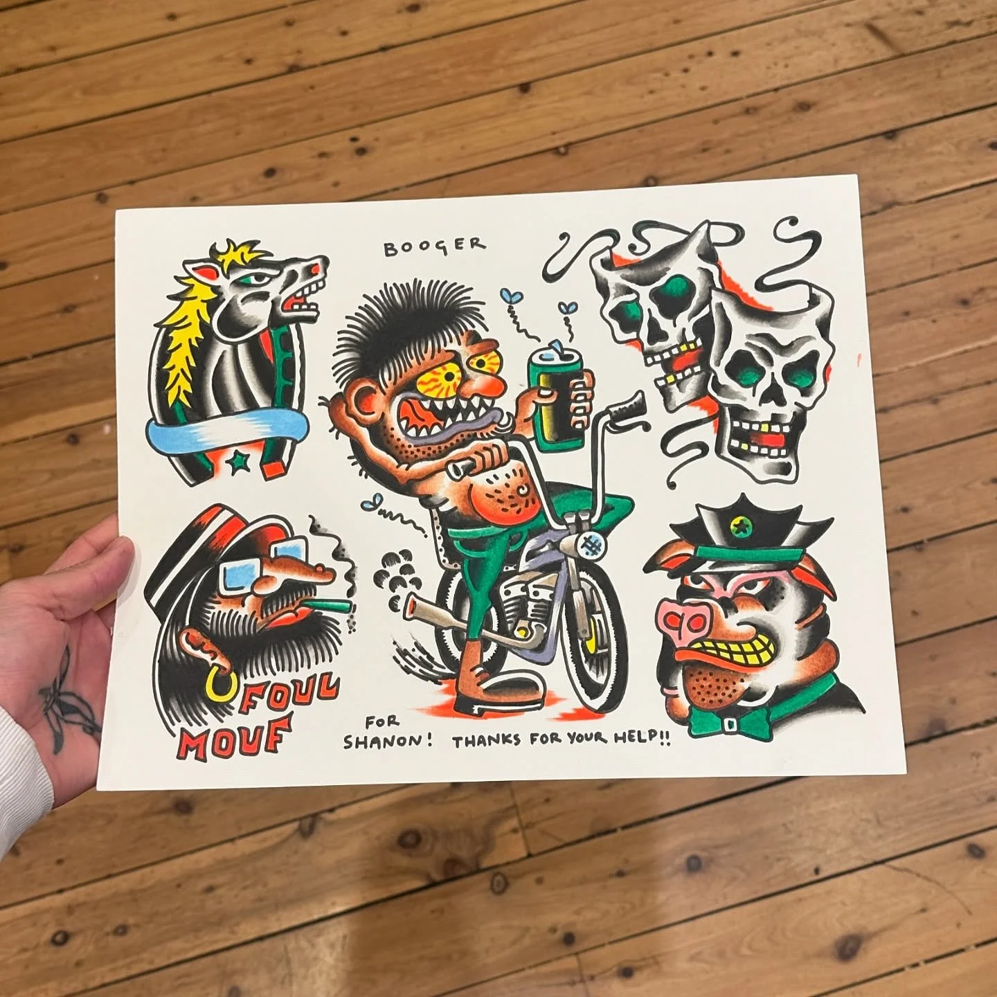 Colorful cartoon sticker sheet showing various characters including a roaring horse with a blue bandage, a man with sunglasses riding a bicycle holding a drink, two skulls with smoking pipes, a bearded man with a cigarette and the words "FOUL MOUTH" 