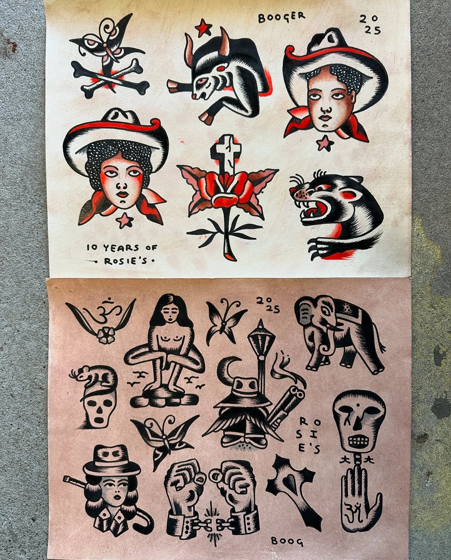Tattoo flash sheet featuring traditional style designs including a butterfly, a bull, a girl with a cowboy hat, a wolf, a rose with a cross, a lion, a woman sitting cross-legged, a butterfly, a lantern, an elephant, a skull, a woman with a hat and an