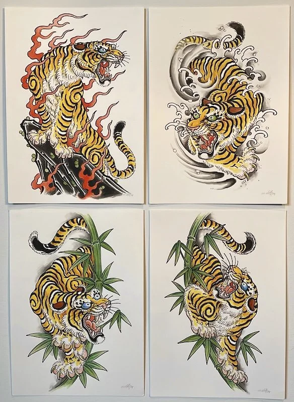 4 tigers.jpeg