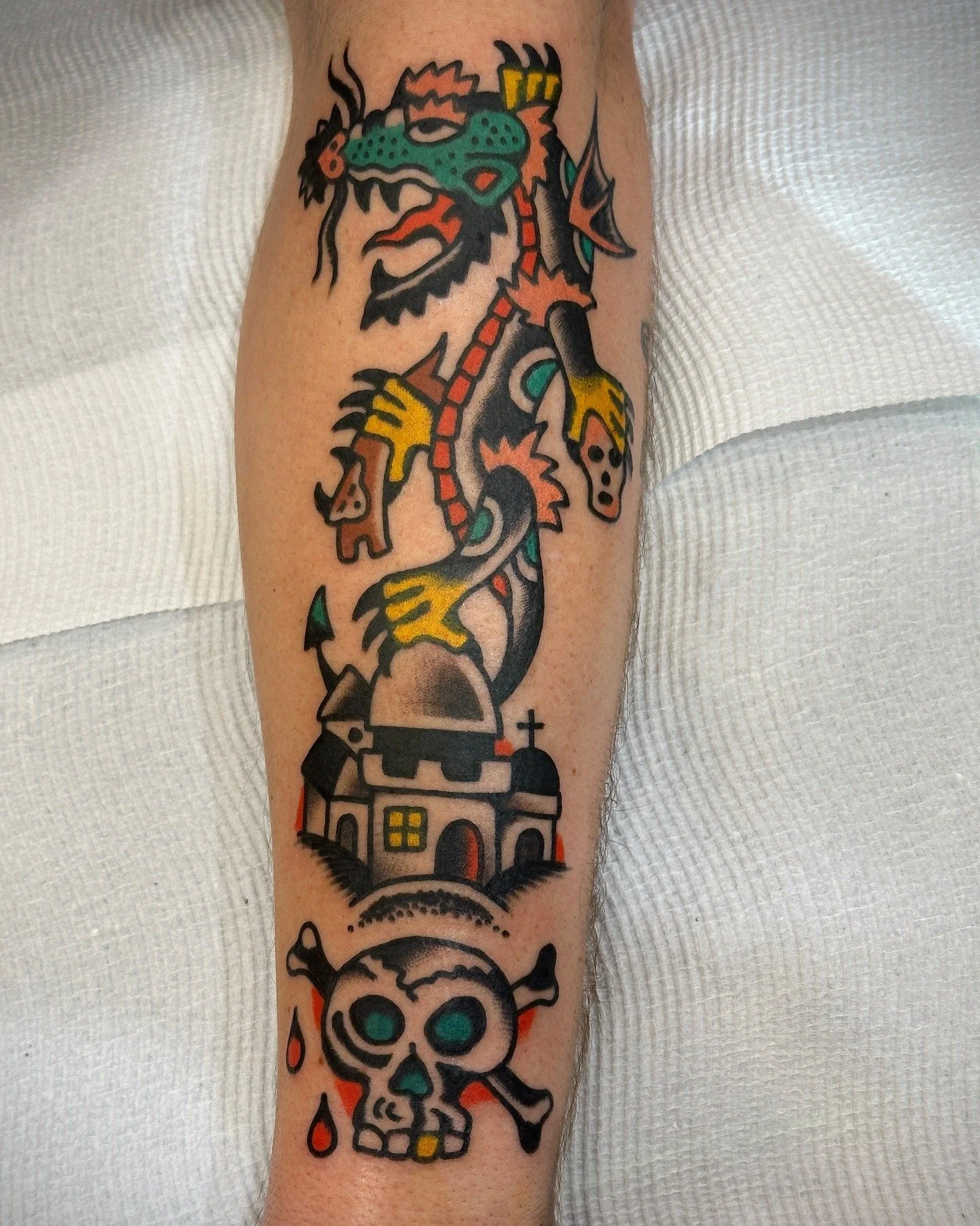 Traditional colour dragon and skull tattoo made at Tattoo Rosie's Surry Hills, Sydney