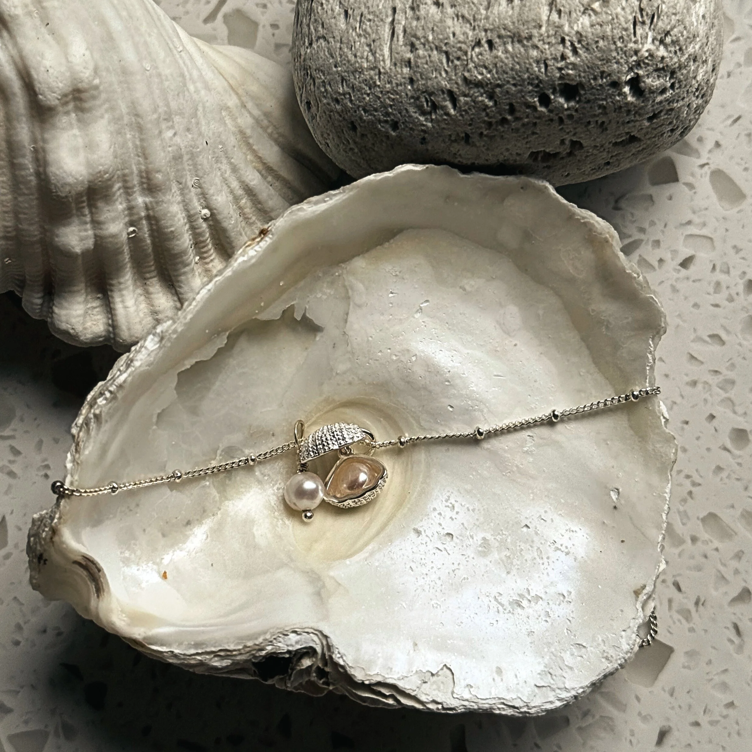 shell pearl neck open.jpg