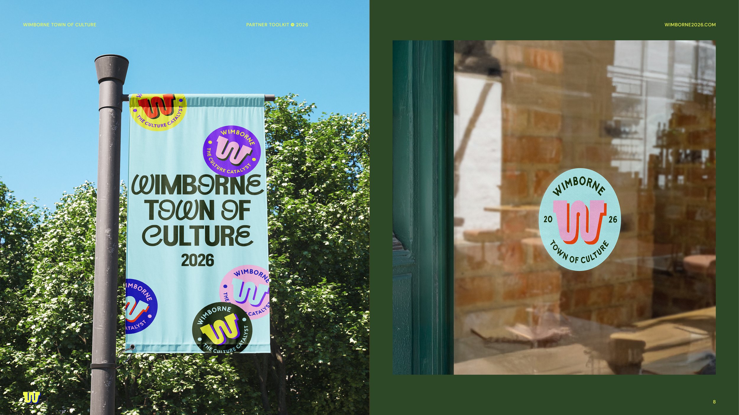 A light blue vertical banner with the text "WIMBORNE TOWN OF CULTURE 2026" and multiple colorful circular logos, hanging from a pole amidst greenery. Next to it, a glass window displays a round sticker with the words "WIMBORNE TOWN OF CULTURE" and th