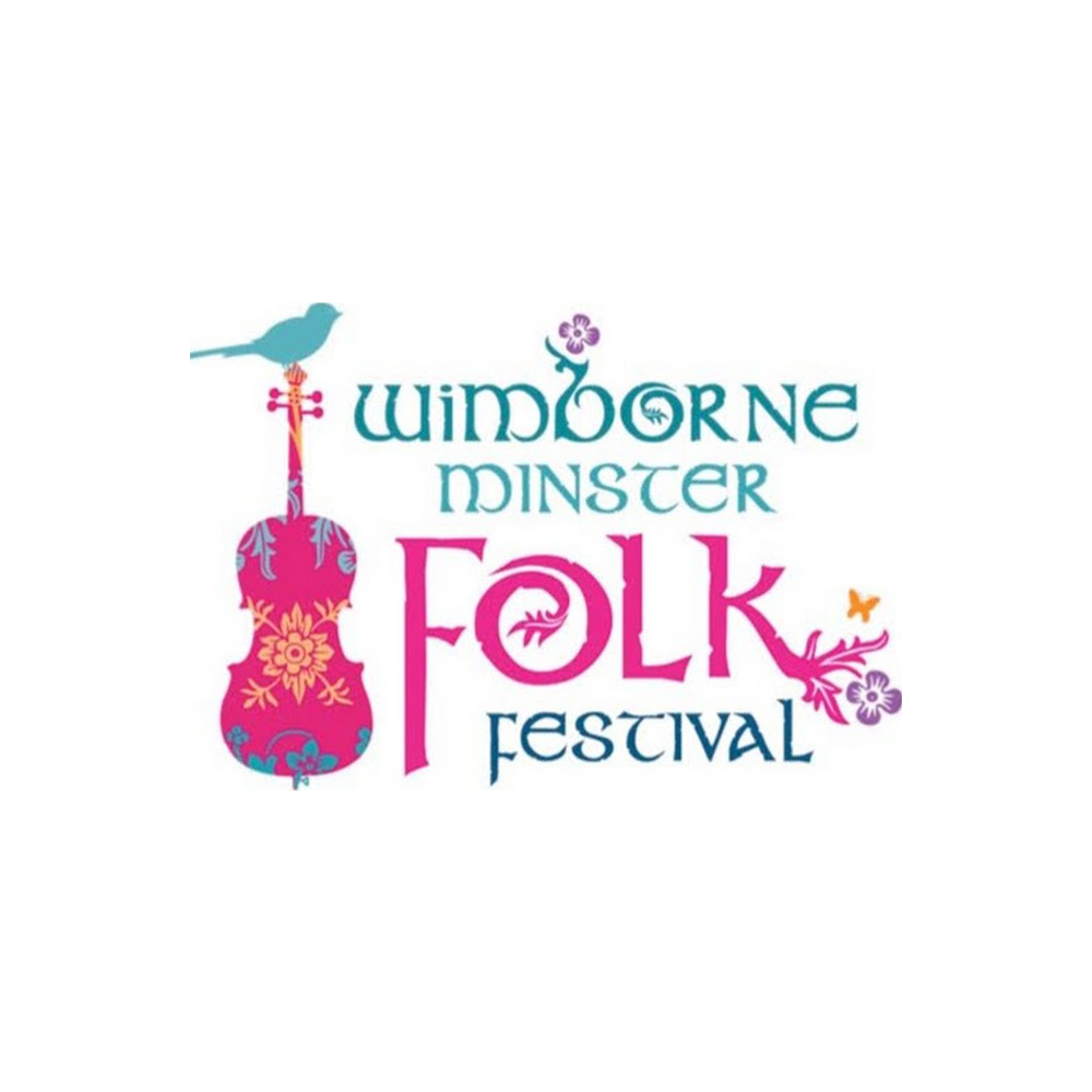 Logo for the Wimborne Minster Folk Festival featuring a stylized pink and purple guitar with floral and leaf designs, a blue bird perched on the guitar's neck, and text in various shades of blue and pink.