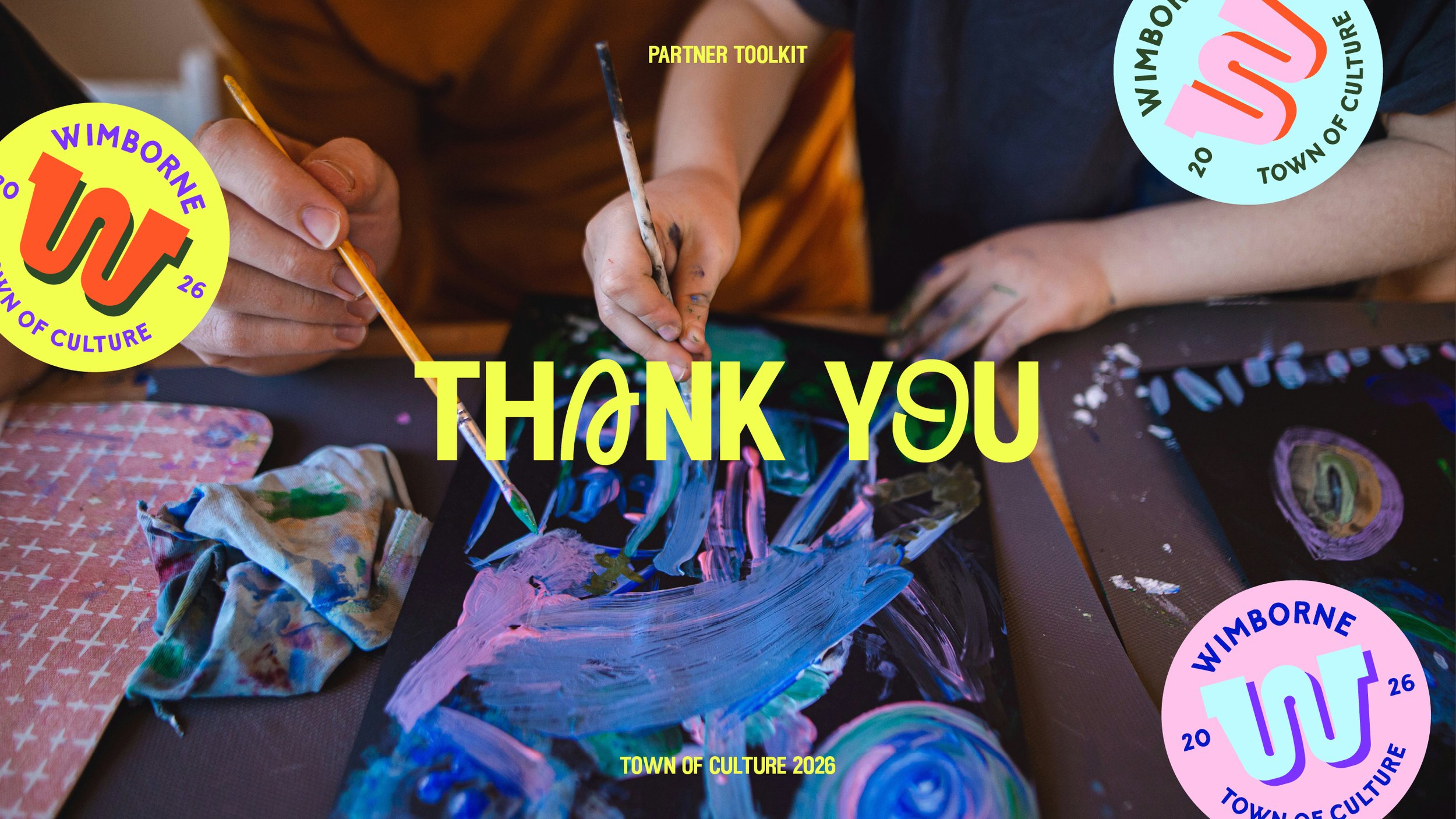 Two individuals paint on canvases with brushes, surrounded by art supplies, during a community art activity. The overlay text says "Thank You" in large yellow letters, with promotional stickers of the Wimborne Town of Culture 2026 logo.