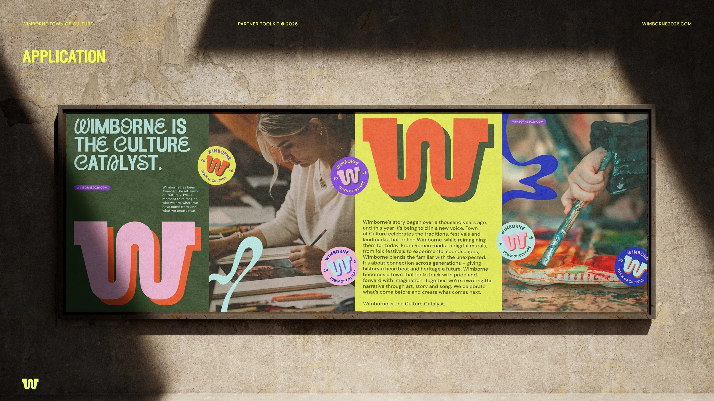 A colorful street poster features the slogan "Wimborne is the culture catalyst" and an explanation of Wimborne's cultural story. The poster includes images of a woman painting and a paintbrush in a gloved hand, along with vibrant design elements, log