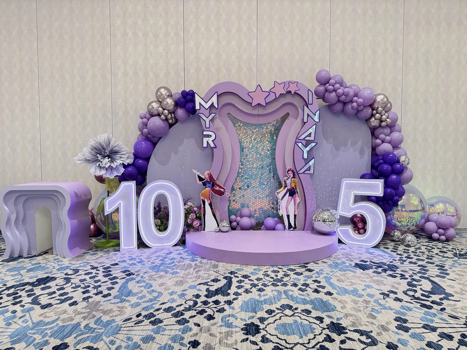 Purple birthday backdrop with LED marquee numbers, marquee letters and balloon garland at Magnolia Grand Conference and Event Center in Prince William County