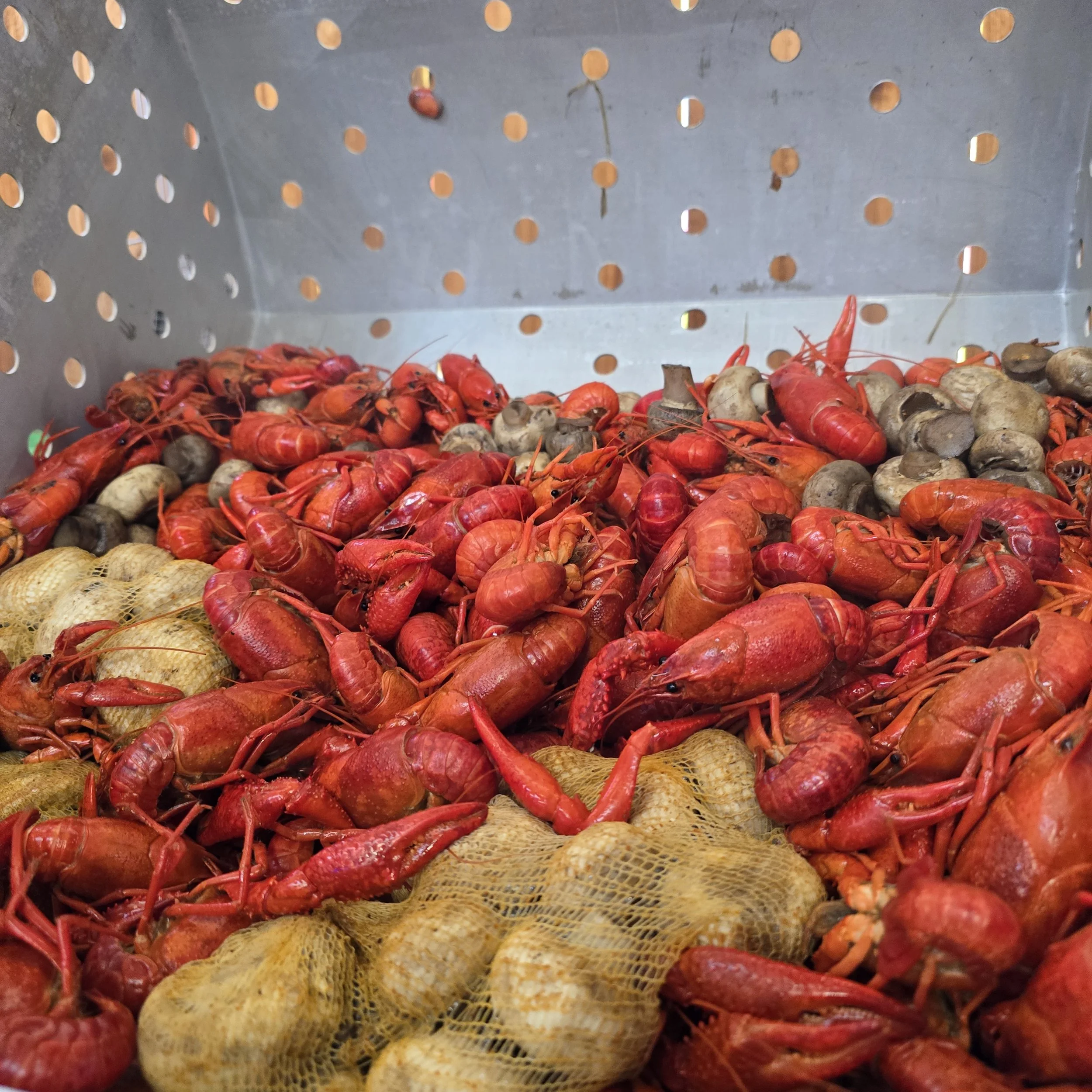 Cooked crawfish and mushrooms.