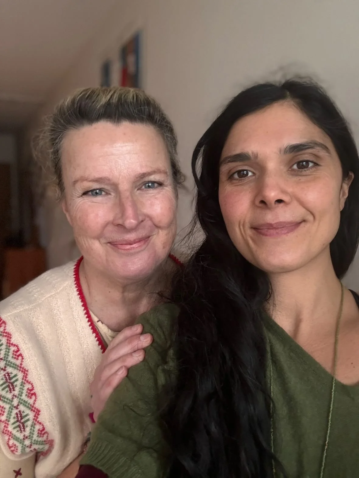 two woman smiling