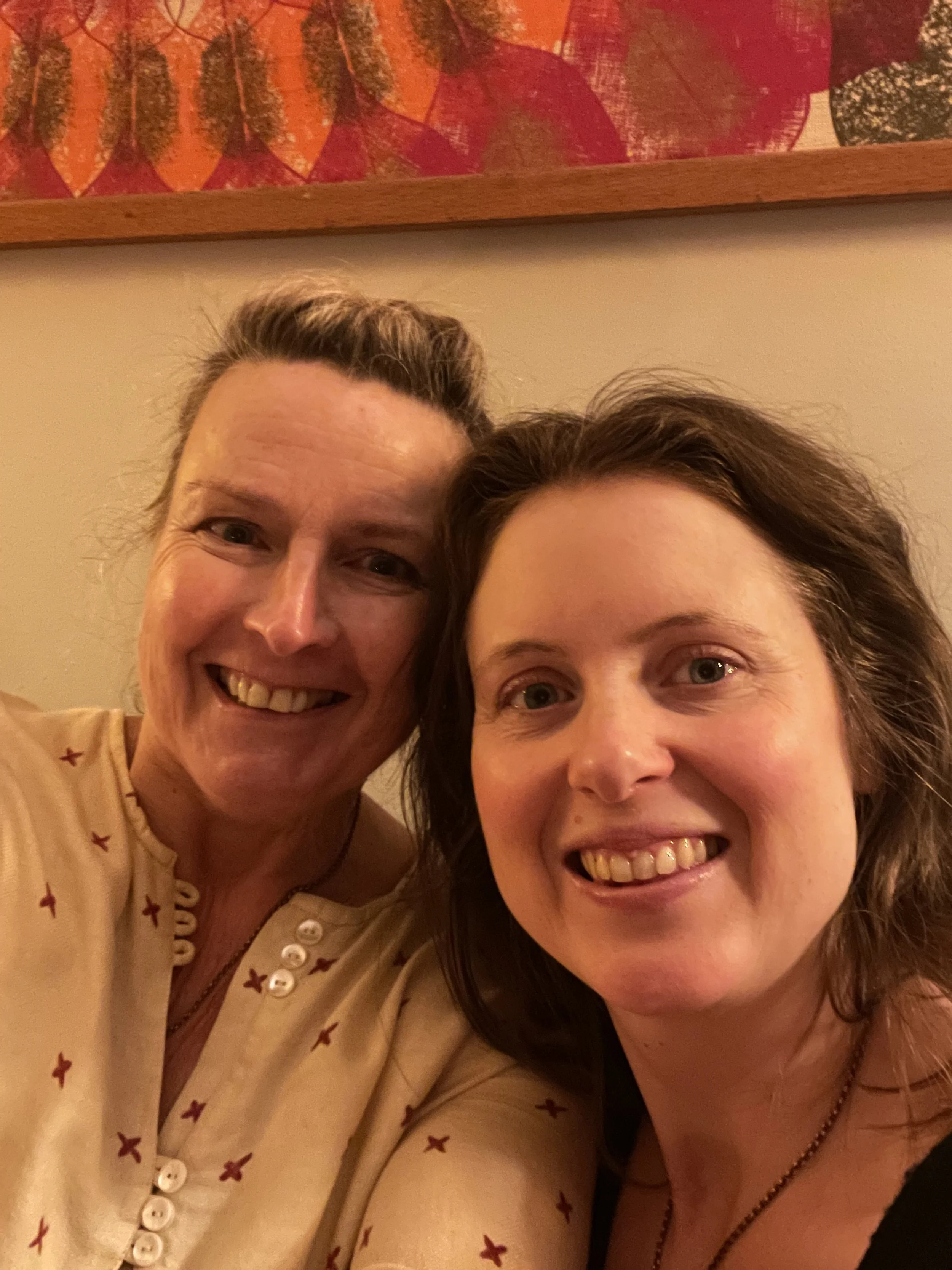 two woman smiling