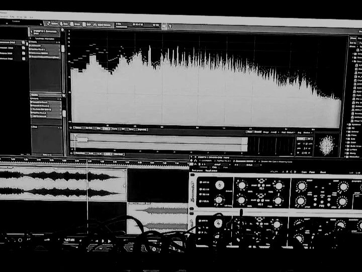 Music production software with audio waveforms, equalizer settings, and sound frequency visualizations.