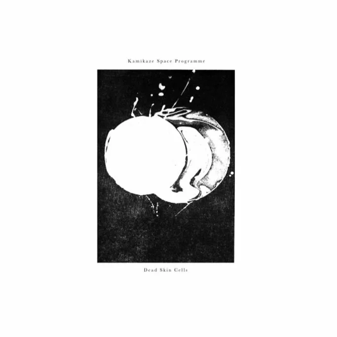 Black and white abstract with a large white circle in the center, surrounded by brush strokes and splashes, with the text 'Kamikaze Space Programme' at the top and 'Dead Skin Cells' at the bottom.