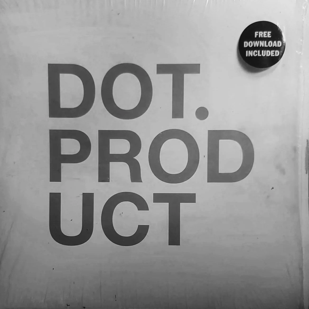 A large poster with the words "DOT. PROD UCT" written in bold capital letters, and a smaller black circle in the top right corner with the text "FREE DOWNLOAD INCLUDED".