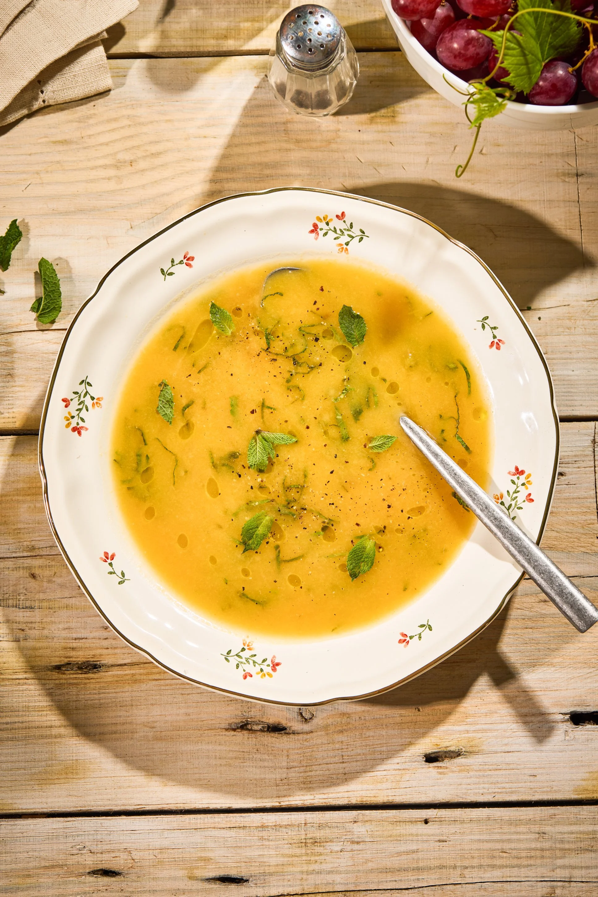 Crown prince squash soup with fresh mint and olive oil