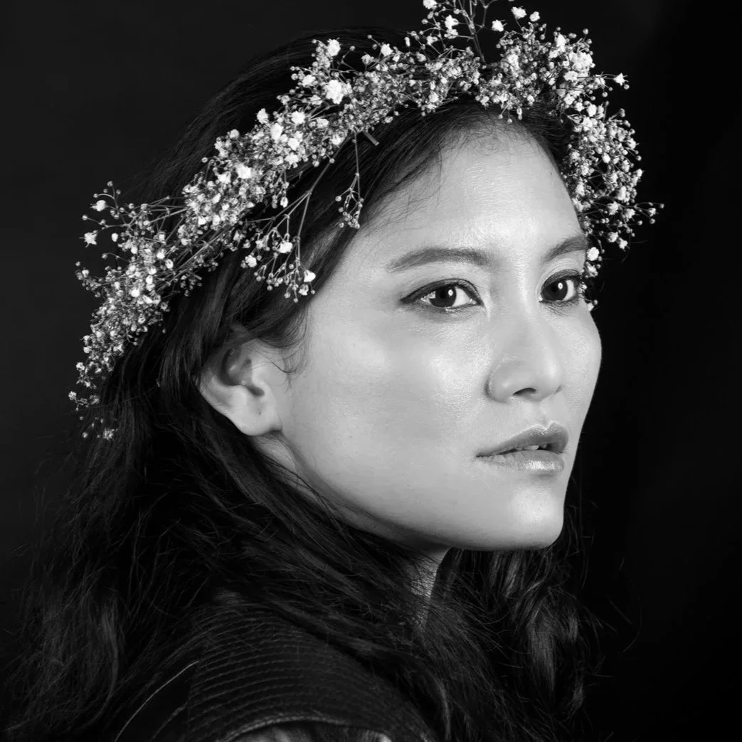 Portrait of woman, flower headrest, photographed boy Wendy Akers