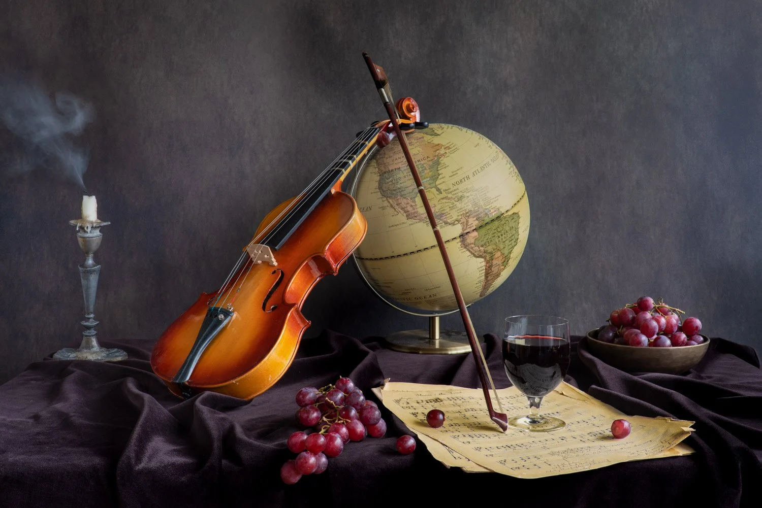 Still Life of Violin, must, grapes and globe of the world, by Wendy Akers