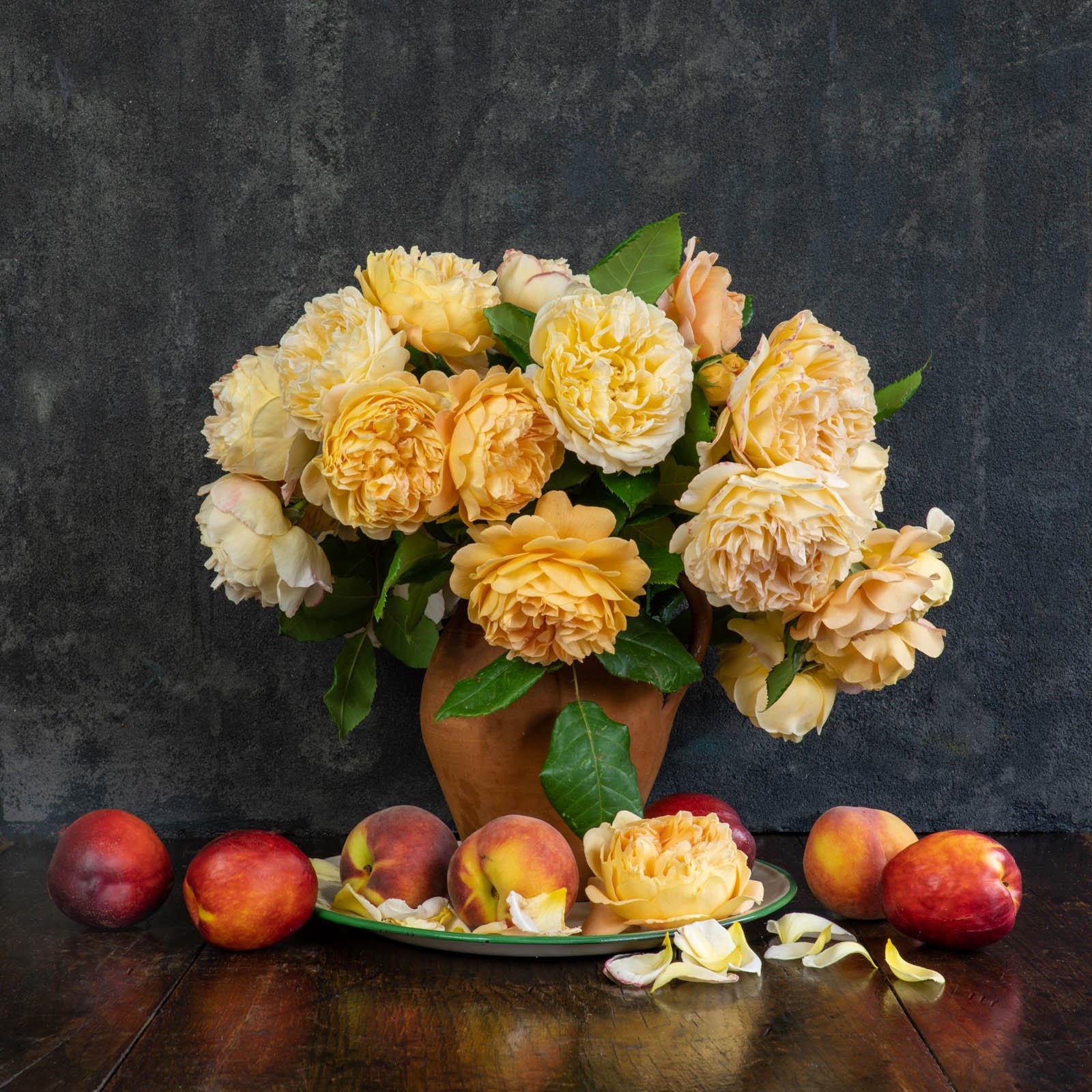 Still life of roses, nectarines and peaches, photographed by Wendy Akers