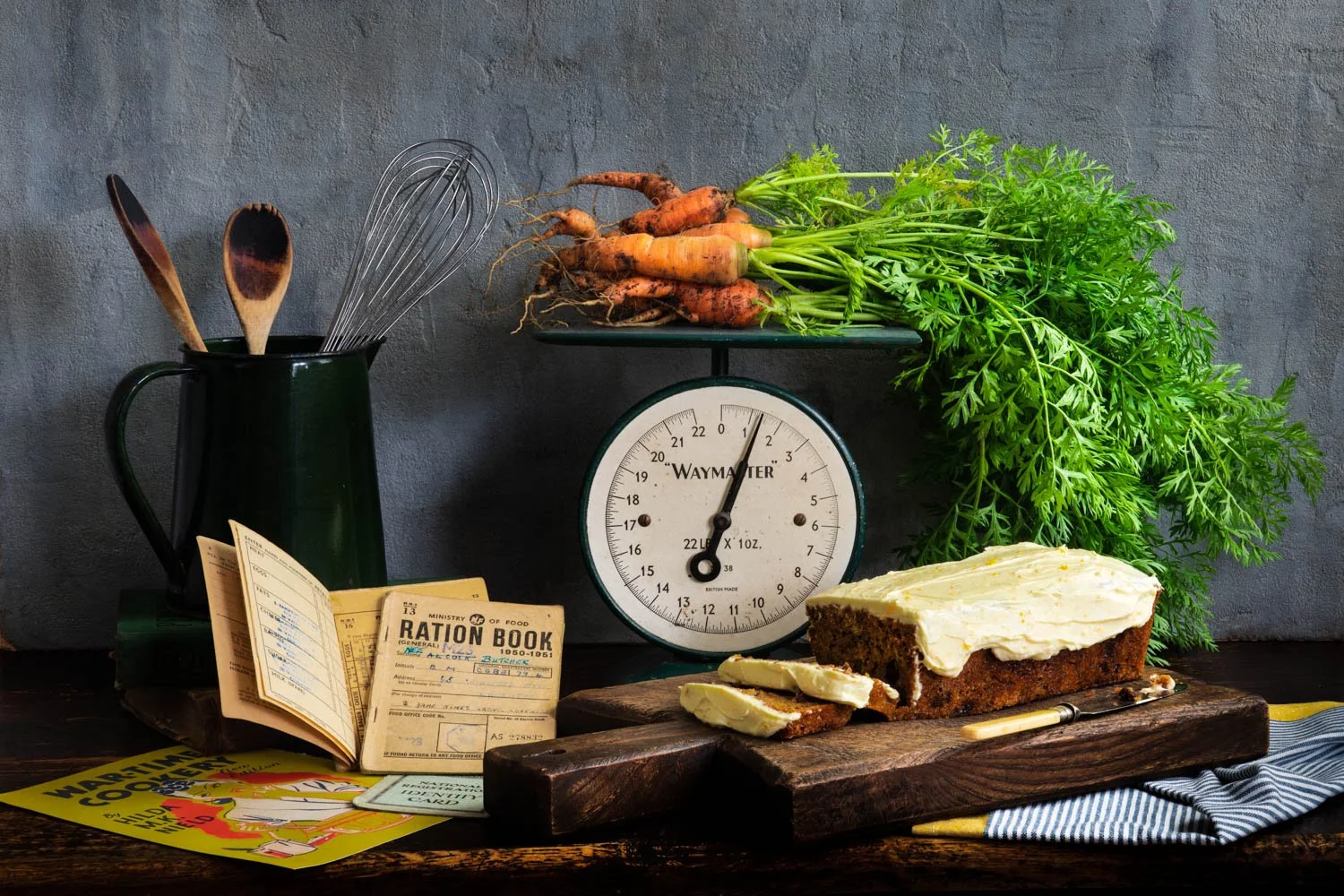 World War II Carrot Cake with ration books and freshly harvested carrots