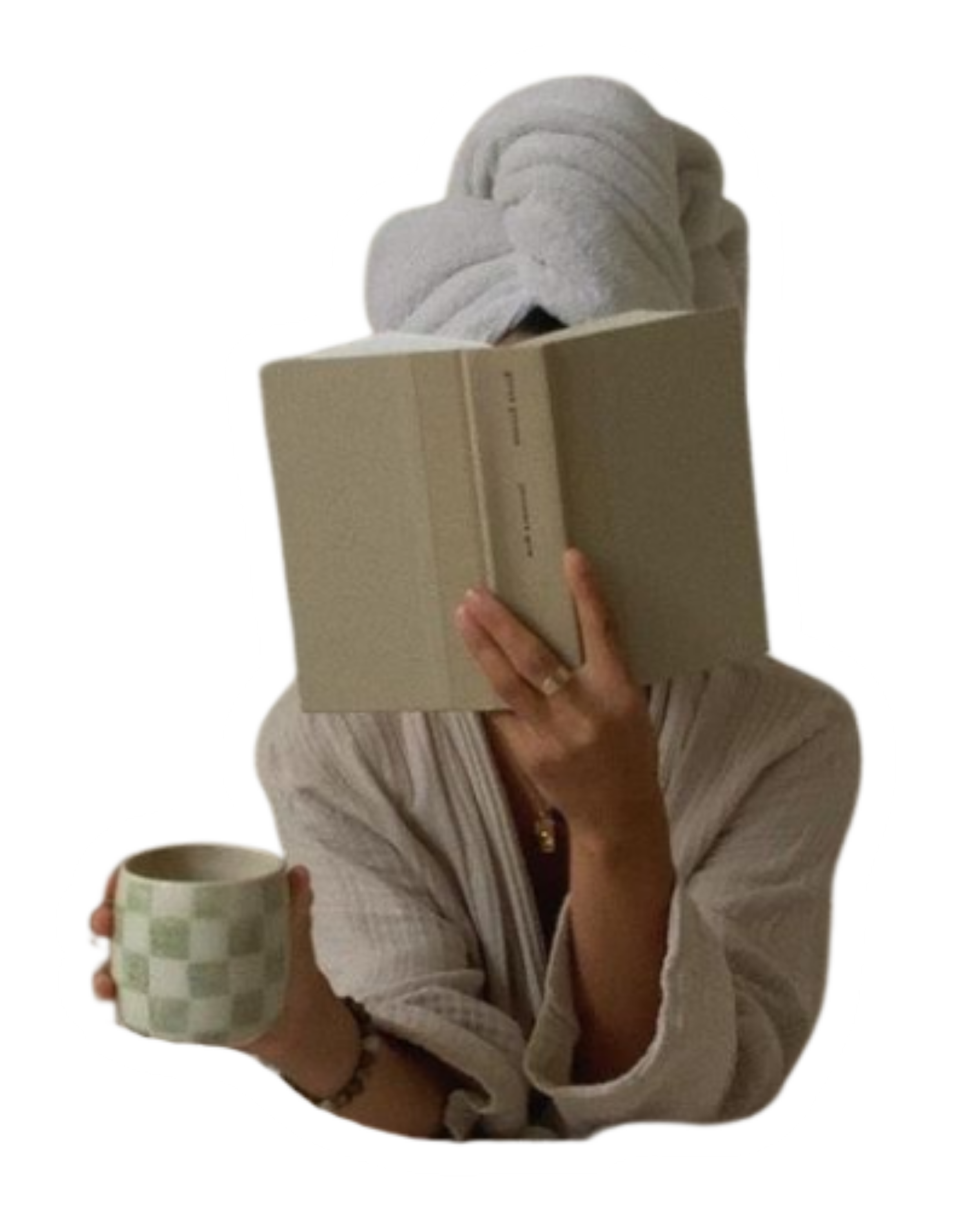 A person with a towel wrapped around their head, wearing a striped robe, reading a book and holding a checkered mug.