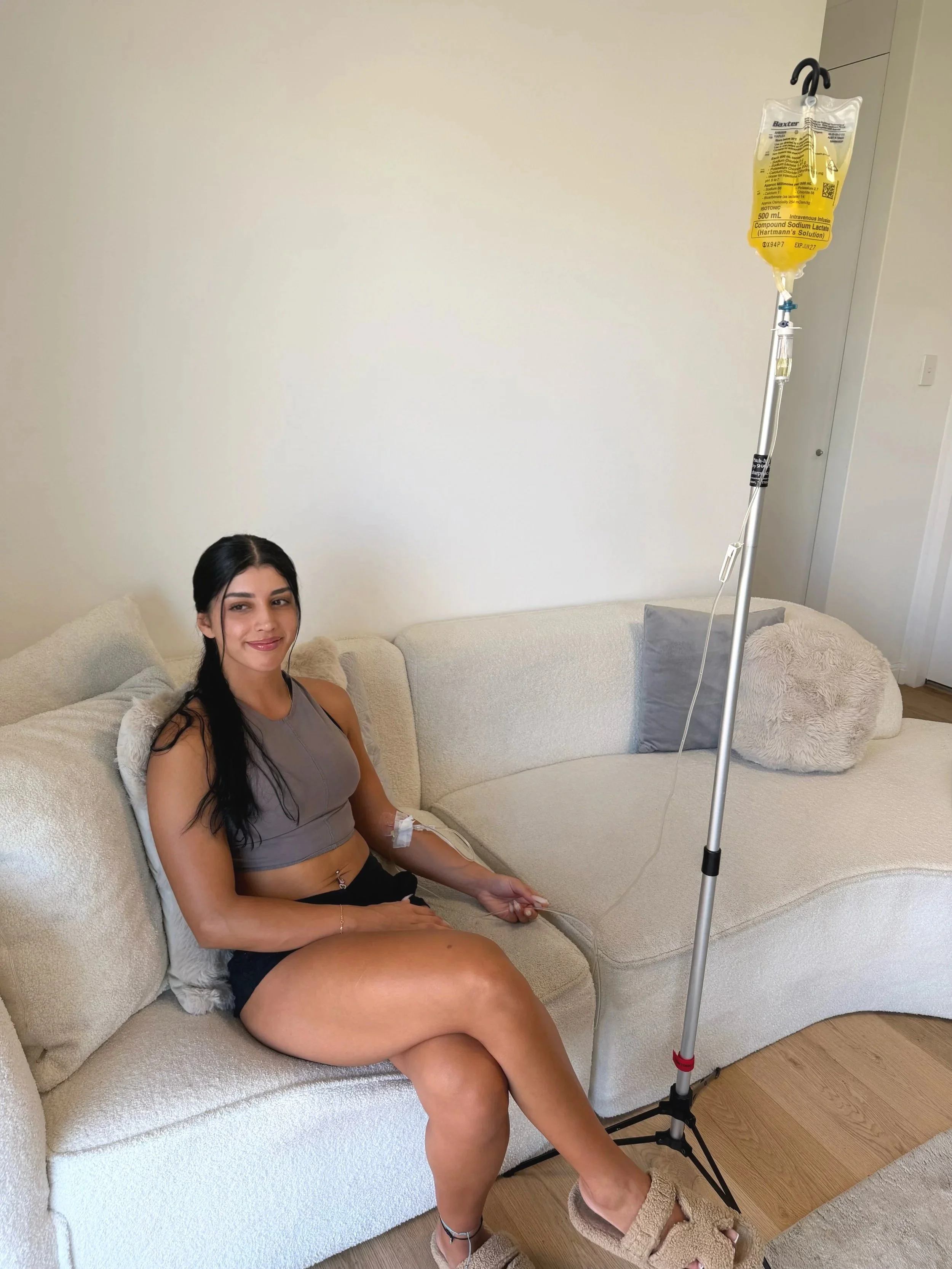 A female receiving an iv vitamin infusion