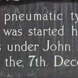 Close-up of partial text on a black background, mentioning 'pneumatic' and a date in December.
